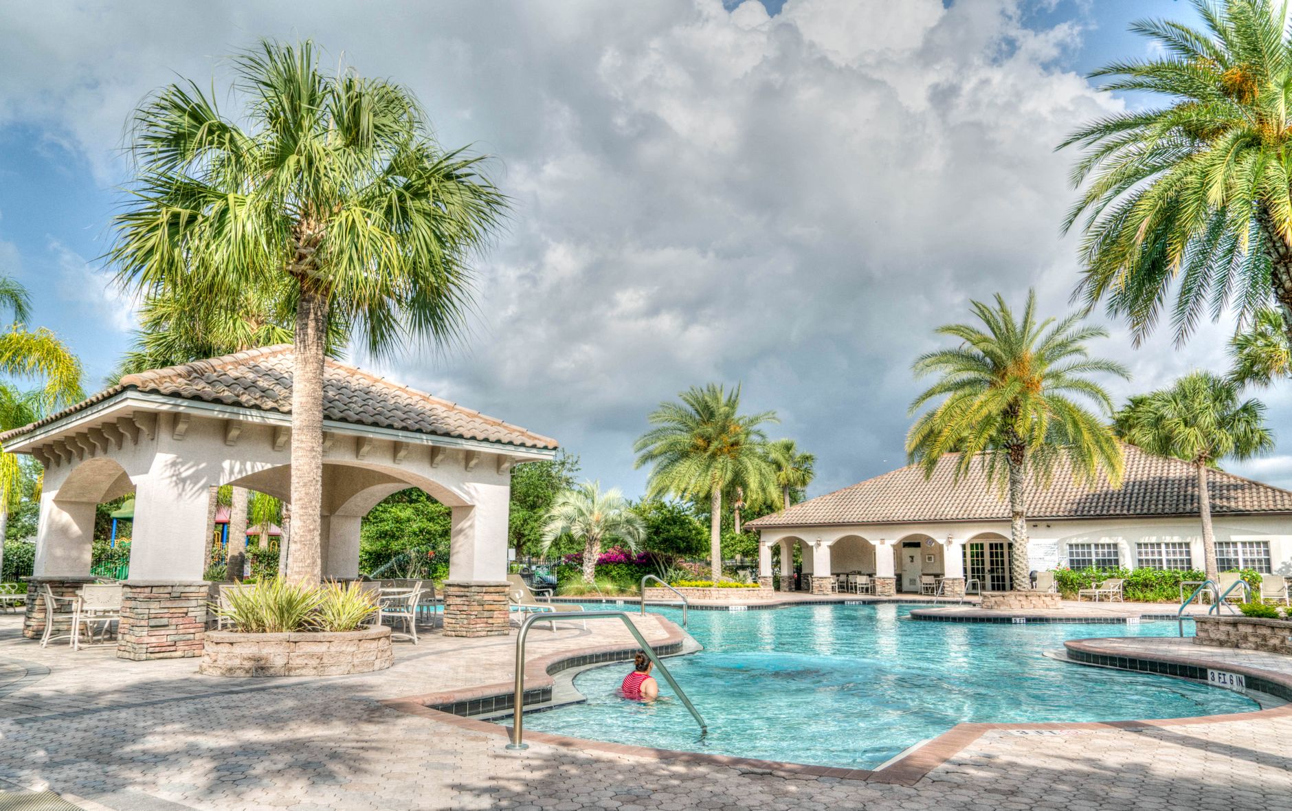 A crystal-clear pool serviced by Alex Pool Cleaning